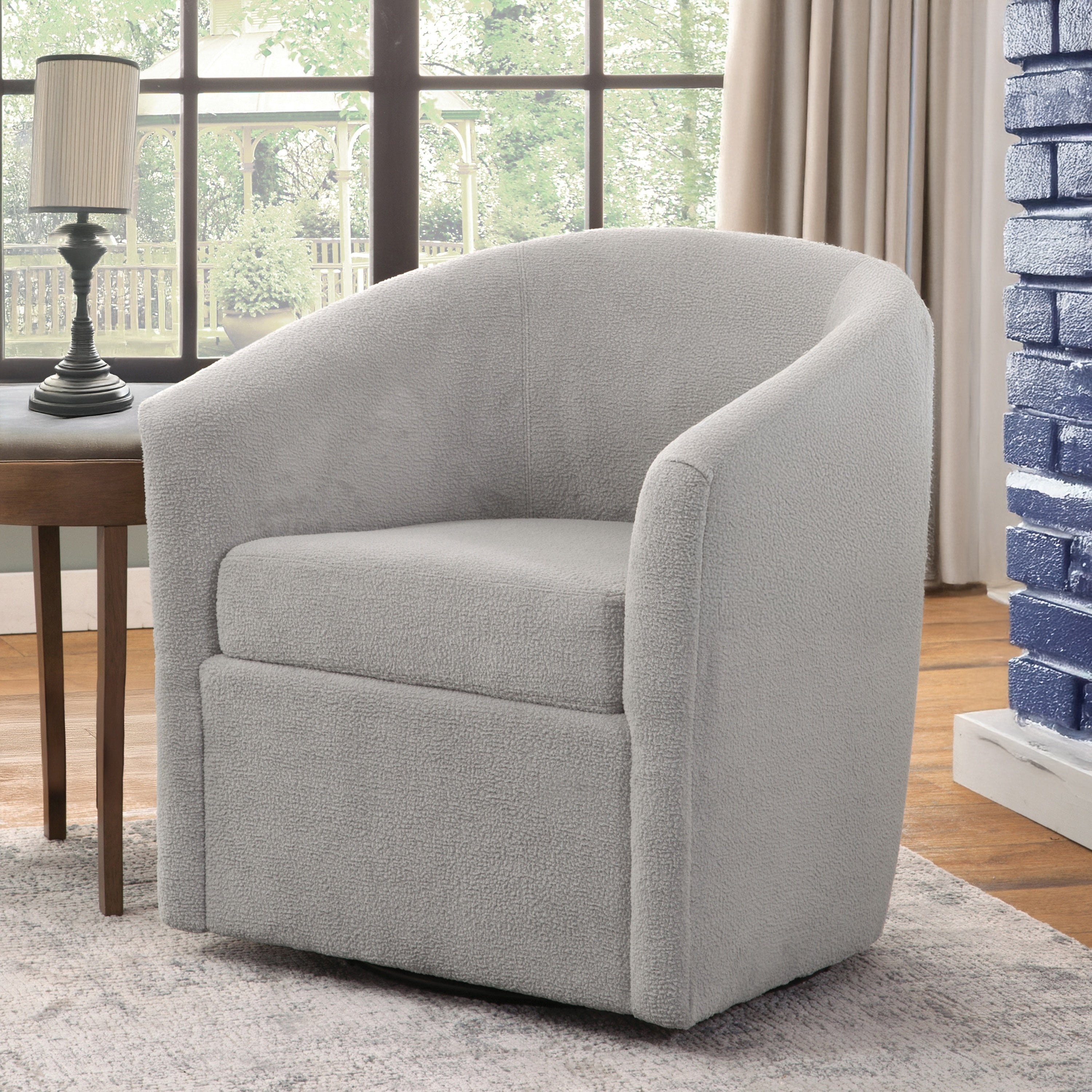 Oaklynn Barrel Style Swivel Accent Chair with Performance Fabric